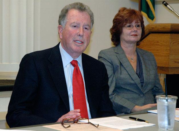 US HealthVest President and CEO Richard Kresch and Vice President Stacie York answer questions during the public hearing for their Certificate of Need application on Oct. 17.