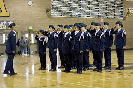 Arlington High School Junior ROTC cadets salute during the January 2009 drill team meet at the high school. The school will be playing host to 10 schools during a Dec. 12 competition.