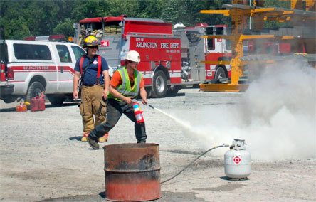 Arlington firefighters provide “hands-on” fire extinguisher training to HCI Steel workers June 30.