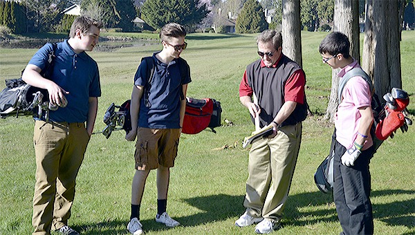 Lakewood boys coach Larry Heller talks with some of  the younger players on his team.