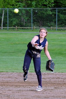 Sophomore shortstop Rrachel Backlund rushes to throw an M-P runner out at first.