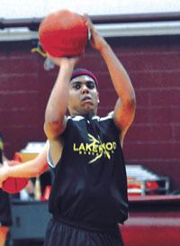 Lakewood senior guard forward Paul Coleman elevates to shoot a jump shot during the Lakewood varsity practice on Nov. 22.