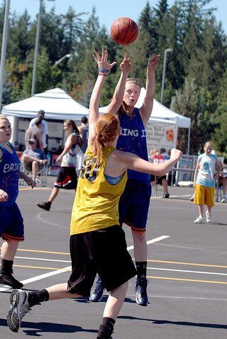 Lindsay Brown of Geeks in Sneaks shoots a jumper during the first day of competition at the I-5 Extravaganza 3-on-3 Basketball Tournament at Tulalip Resort Casino.