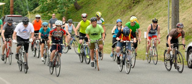 Cyclists take off from the starting line  of the Pedal