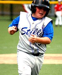 Tristan Sheward celebrates after hitting a home run.