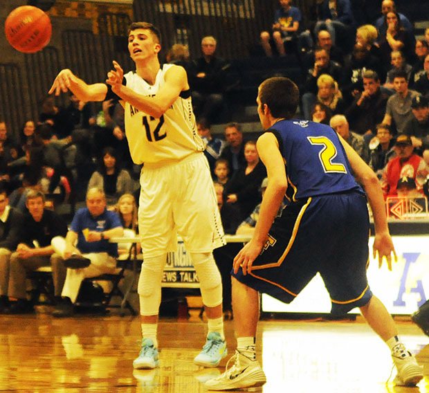 Arlington's Nathan Aune passes the ball.