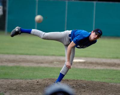 Stilly Valley juniors pitcher Ryan Walker throws a curve ball to get one of his nine strikeouts against Granite Falls in a 2-1 loss.