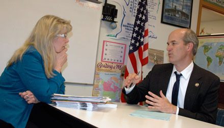 The School Box owner Nola Smith speaks with U.S. Rep. Rick Larsen on Monday