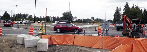 A primitive version of the roundabout is done so traffic won't be completely tied up by construction as school begins.