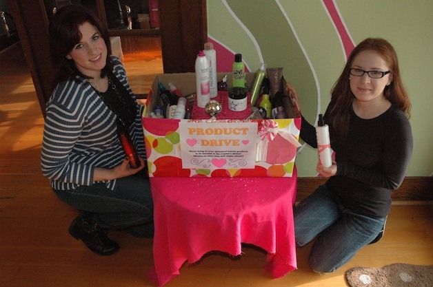 Studio 5 Hair Design employees Erica Rodgers and Aleida Wilmes show off their haul so far for the Monroe Gospel Women's Mission Center.