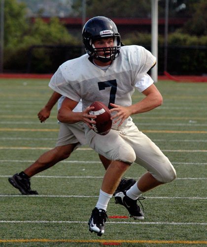 Junior quarterback Blake McPherson scans the field