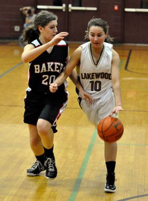 Lakewood senior Caitlyn Darrah fends off Mount Baker senior Anna Davila.