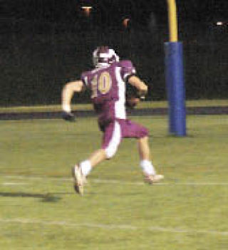 Lakewood senior Jordan Stauffer outruns the Coupeville defenders for a touchdown.