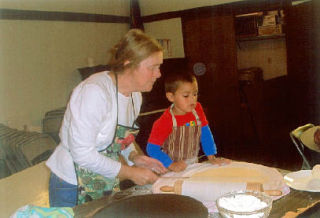 Everett Fuentes learns how to roll out lefse from Becky Sather in the effort to prepare for the Peace Lutheran Churchâ€™s Womenâ€™s Bazaar in Silvana Nov. 1. Along with lefse the bazaar offers a great variety of baked goods