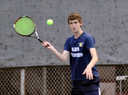 Arlington’s Tyler Bradford prepares to return a volley in the Wesco 4-A Division Tournament