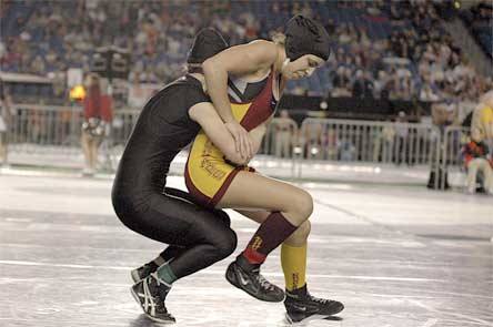 Lakewood’s Keely Caldwell escapes out of her opponent’s hold.