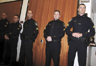 Five police officers with the city of Arlington’s Police Department were promoted at the Dec. 1 City Council meeting. From left