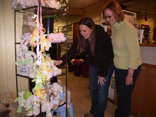 Tricia Gross and Linda Hoffer are one of two mother-daughter teams who found a golden egg in the Downtown Arlington Golden Egg Hunt April 11.