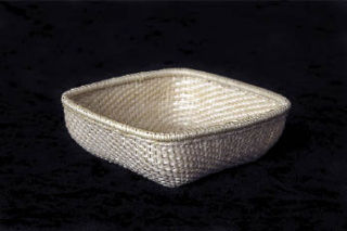 A German-style basket by Marysville craftsman Bill Roeder is one of two baskets he has included in the Containers