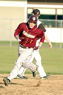 Cory Moore jogs the bases after blasting a home run to kick off a nine-run fourth inning.