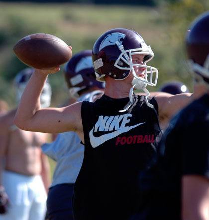 Lakewood senior quarterback Justin Lane gets ready to lead the Cougars’ offense for the fourth year.