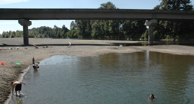 The Stillaguamish River bed is nearly bare beneath the I-5 bridge at the north end of Arlington.