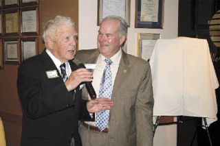 Dr. Ben Burgoyne welcomes Dr. Lee Harman  to the Wall of Honor at Cascade Valley Hospital.