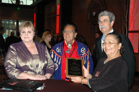 'Organ Lady' and registered nurse Colleen Williams presents Tulalip Tribes Board member Stan Jones Sr.