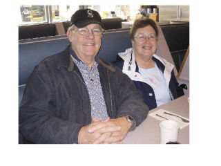 Mel and Rosalie Bratley enjoy breakfast at the Blue Bird Cafe after learning they were the winners of a Thomas Kincaid print of Disneyland’s 50th anniversary celebration. The raffle was part of the cafe’s own 50th anniversary celebration