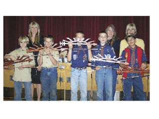 Scouts earning the Arrow of Light award are