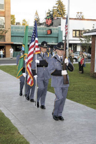 The Arlington Police Department Color Guard marks the start of ceremonies for Arlington American Legion Post 76’s Sept. 11 memorial at Legion Park.