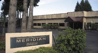 The parking lot of Meridian Yachts is empty on a Sunday