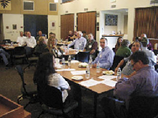 Employees of some of the city’s largest employers join the city of Arlington staff and elected officials and volunteer members of the city’s economic development committee for lunch in the City Council Chambers Friday