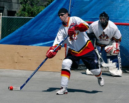 Ryan Sherwood of Arlington passes to a Sting II teammate.