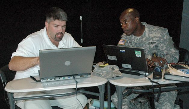 ‘Hero 2 Hired’ Mobile Job Store staff member Daniel Hannah and Sgt. Maj. Wayne Bowser Sr.