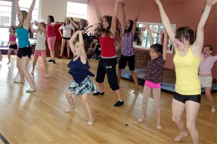 Dancers from age 6 to 18 dance together in “The Pirates” at the Northwest Dance and Acro school in Arlington. They are preparing to present a performance at the Byrnes Performing Arts Center Saturday