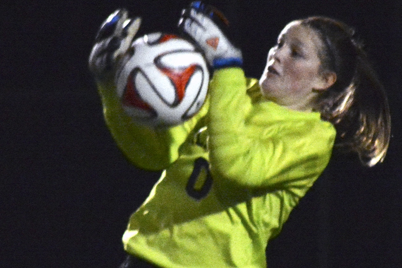 Brandon Adam/Staff Photo                                Arlington’s Brielle Schrader makes a save.