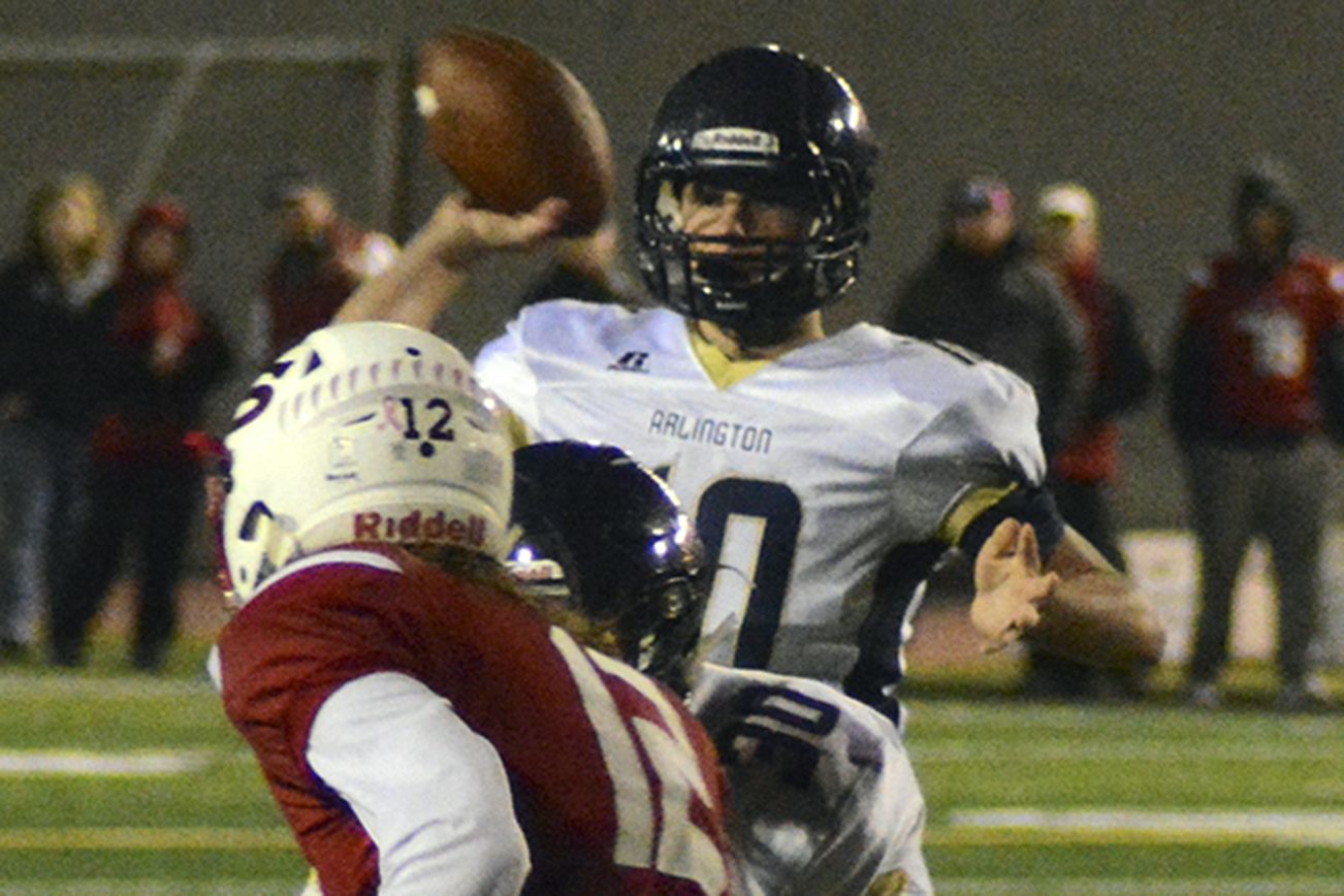 Brandon Adam/Staff Photo                                Arlington quarterback Anthony Whitis prepares to throw pass.