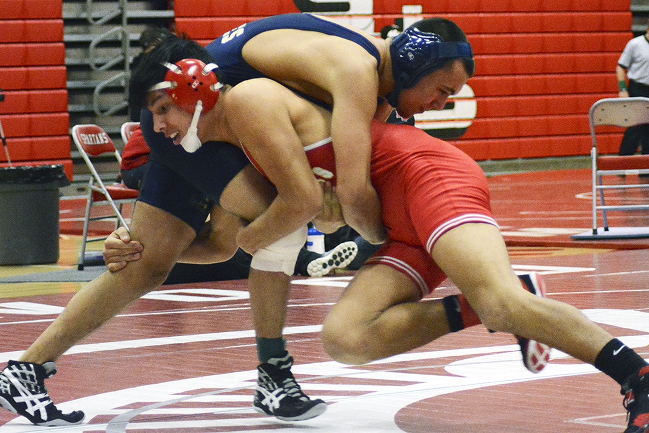 Local wrestlers champion at 3A district tournament; others also qualify to regionals (slide show)