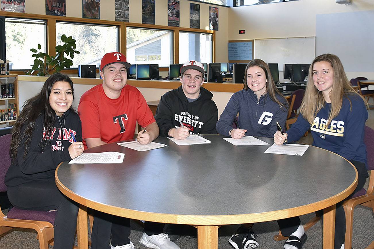 Five Arlington student athletes signed their letters of intent