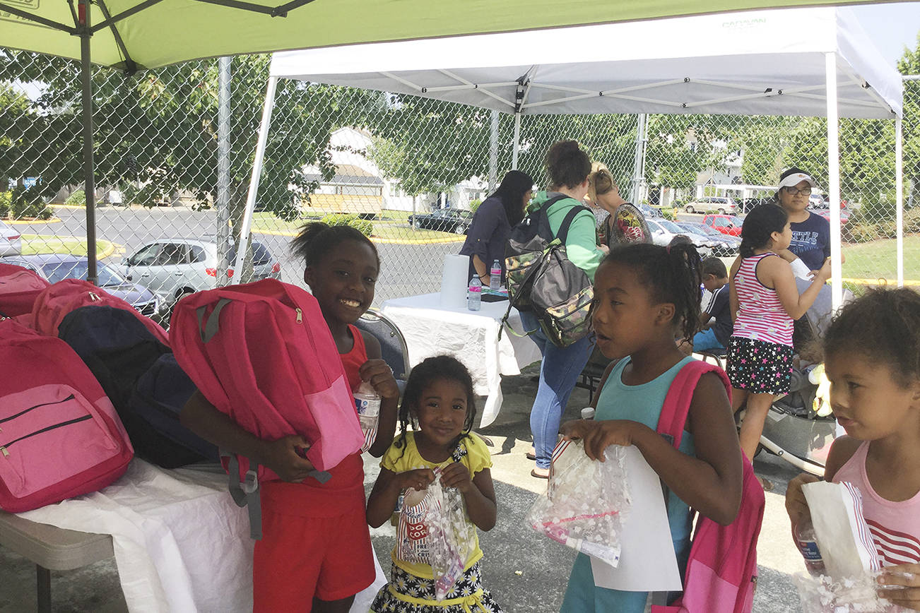 Cedars on 67th Apartments gives free back-to-school backpacks to tenant kids