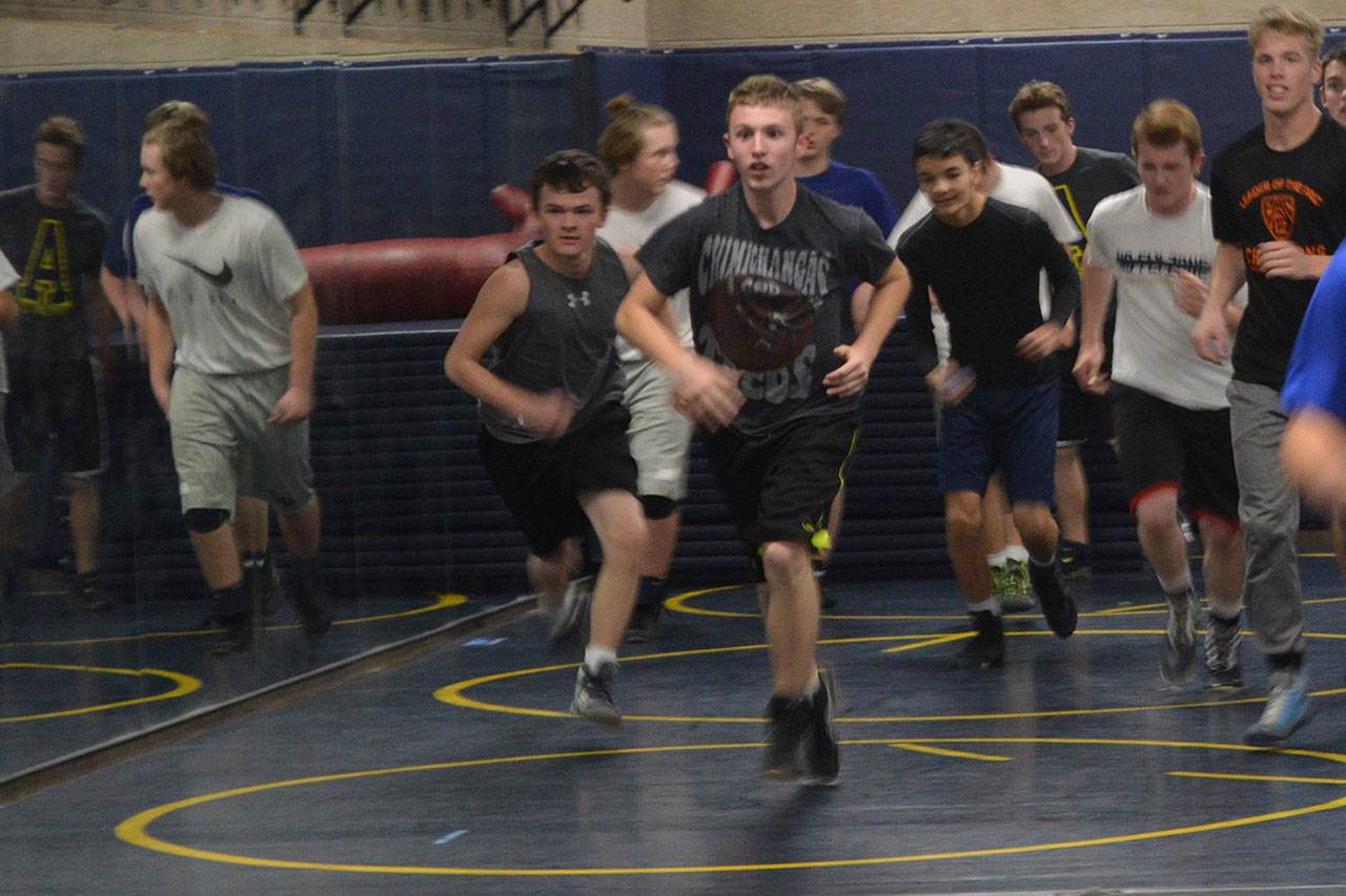 Rork leads strong Arlington wrestling team (slide show)