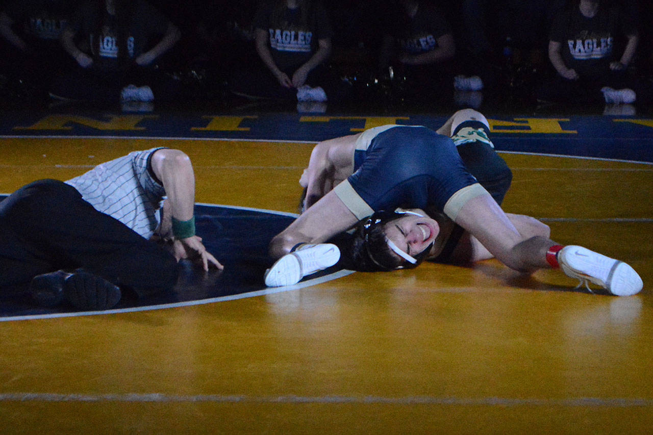 Arlington edges MG in wrestling